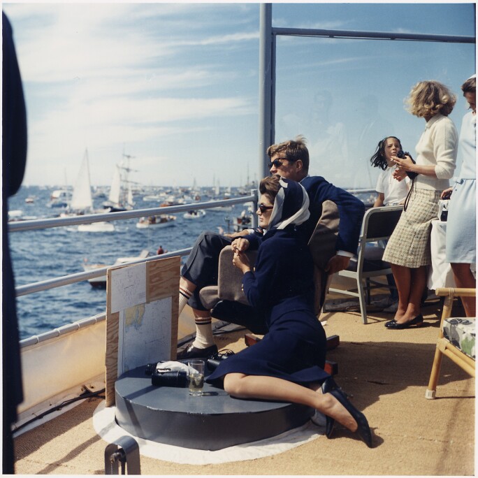 Watching_the_America's_Cup_Race._Mrs._Kennedy,_President_Kennedy,_others._Off_Newport,_RI,_aboard_the_USS_Joseph_P...._-_NARA_-_194214.jpg
