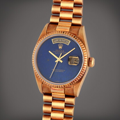 Catalog image of Day-Date, Reference 18038 | A yellow gold wristwatch with day, date, bracelet a…