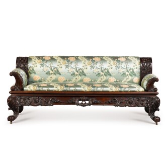 View 1 of Lot 120: A large carved hongmu sofa Qing dynasty, 19th century | 清十九世紀 紅木翹頭靠床