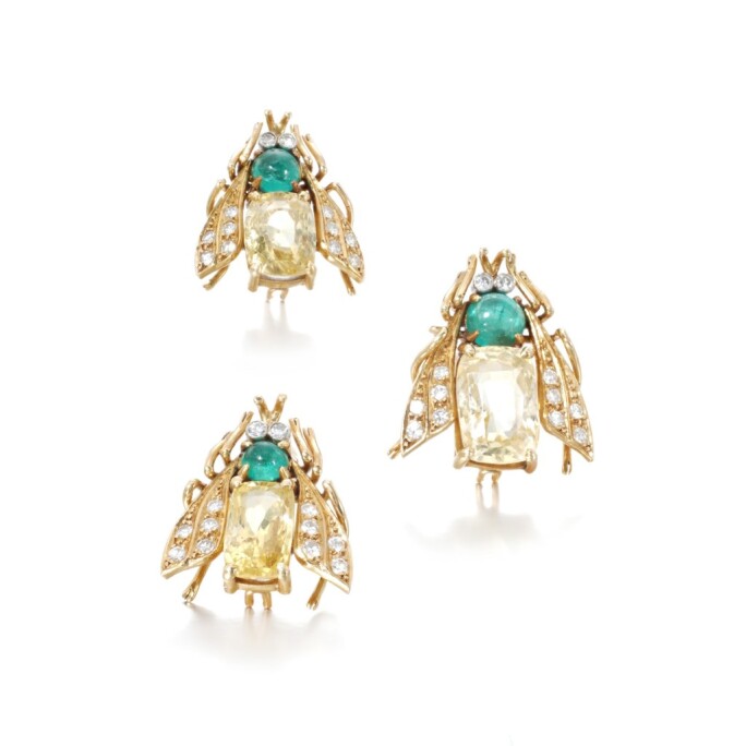 Van Cleef & Arpels | Three yellow sapphire, emerald and diamond brooches. Estimate: 
9,000 - 14,000 CHF