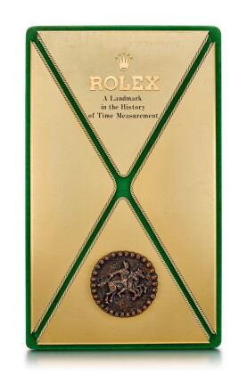 Catalog image of rolex | a gilt brass and leather display, circa 1970