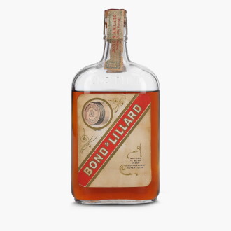 View 1 of Lot 2396: Bond & Lillard Bottled In Bond 100 Proof 1916 (1 Bottle Pint)