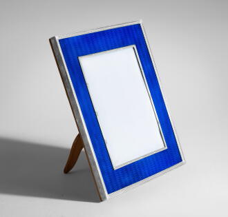 View 1 of Lot 422: A Fabergé Silver and Guilloché Enamel Photograph Frame, Workmaster Hjalmar Armfelt, St Petersburg, 1908-1917