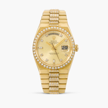 Catalog image of Oysterquartz, Reference 19148 | A yellow gold and diamond-set wristwatch with d…