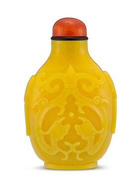 View 1 of Lot 1816: A yellow glass carved 'chilong' snuff bottle Qing dynasty, Jiaqing period | 清嘉慶 黃料螭龍鼻煙壺