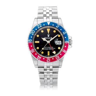 View 1 of Lot 8255: GMT-Master, Reference 16750 | A stainless steel dual time zone wristwatch with date and bracelet, Circa 1984 | 勞力士 GMT-Master 型號16750 | 精鋼兩地時間鏈帶腕錶，備日期顯示，約1984年製