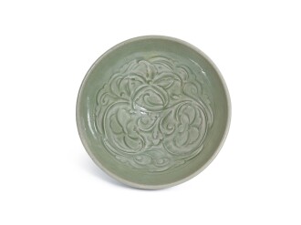View 1 of Lot 5025: A Yaozhou celadon carved 'floral' bowl Jin dynasty 金 燿州青釉劃花卉紋斗笠盌