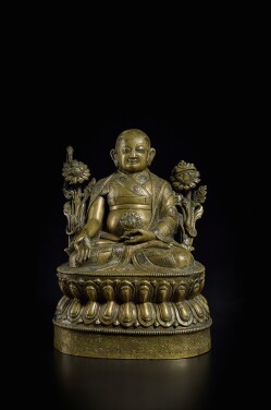View 1 of Lot 816: An inscribed silver and copper inlaid copper alloy figure of Lowo Khenchen Sonam Lhundrup, Tibet, 16th century
