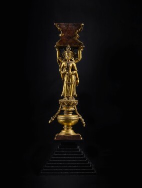 View 1 of Lot 824: A large hardstone-inlaid gilt copper alloy double column support, Tibet, Densatil Monastery, 14th / early 15th century