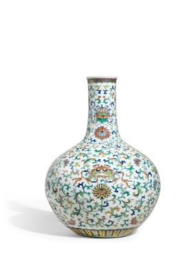 View 1 of Lot 1078: A fine and magnificent doucai and famille-rose gilt-decorated 'bajixiang' vase, tianqiuping, Seal mark and period of Qianlong | 清乾隆　鬪彩加粉彩描金纏枝蓮八吉祥天球瓶　《大清乾隆年製》款