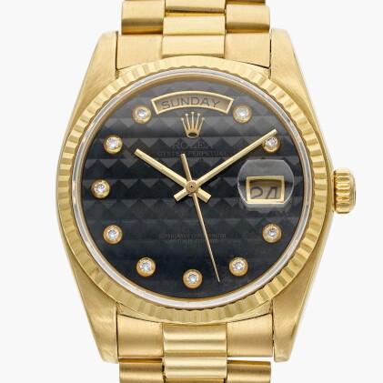 Catalog image of Reference 18038 Day-Date | A yellow gold automatic wristwatch with day, date, b…