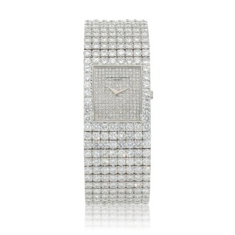 View 1 of Lot 60: Kalla, Ref. 35704-707G White gold and diamond-set bracelet watch Made in 1990 | 江詩丹頓35704-707G型號「Kalla」白金鑲鑽石鍊帶腕錶，1990年製