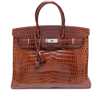 View 1 of Lot 106: Miel Shiny Porosus Crocodile Birkin 35 Palladium Hardware, 2008