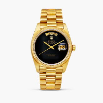 View 1 of Lot 2552: Day-Date, Reference 18038 | A yellow gold wristwatch with Arabic day, date, onyx dial and bracelet, Circa 1982