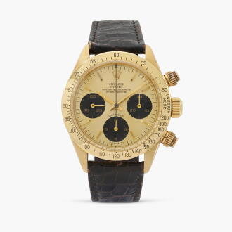 View 1 of Lot 206: Daytona, Reference 6265 | A yellow gold chronograph wristwatch with bracelet | Circa 1987