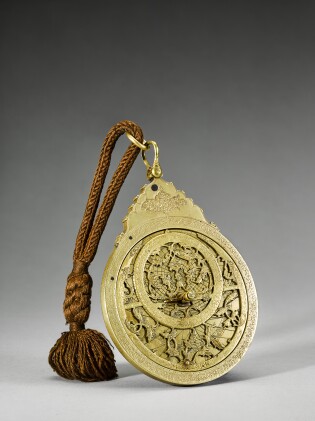 View 1 of Lot 62: A Safavid brass astrolabe, signed by Muhammad Mahdi al-Yazdi, Persia, circa 1660