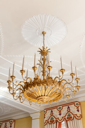 Catalog image of Two Austrian giltwood and cut-glass twenty-seven light chandeliers after a desi…