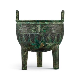 View 1 of Lot 5005: An archaic bronze ritual food vessel, ding Late Shang dynasty 商晚期 青銅饕餮紋鼎