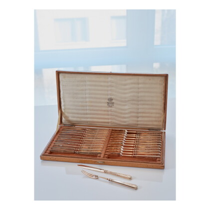 Catalog image of A Set of Silver-Gilt Cake Knives and Forks