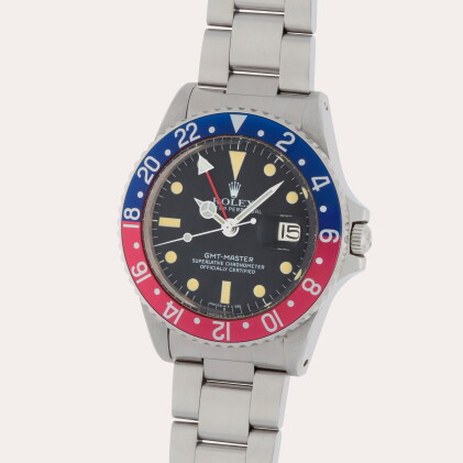 Catalog image of GMT-Master 'Pepsi, Reference 1675 | A stainless steel dual time zone wristwatch…