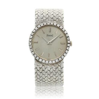 View 1 of Lot 83: Reference 9159  A white gold and diamond-set bracelet watch, Circa 1970 
