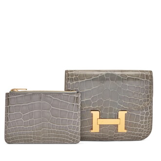 View 1 of Lot 146: Gris Ciment Shiny Mississippiensis Alligator Constance Slim Wallet Gold Hardware, 2024