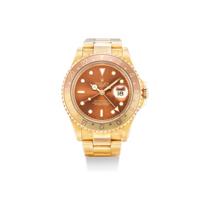 Catalog image of rolex | gmt-master ii, reference 16718, a yellow gold wristwatch with date and …