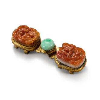 View 1 of Lot 658: A jadeite-inlaid gilt-metal 'chilong' belt buckle, Qing dynasty, 19th century | 清十九世紀 銅鎏金鑲翡翠螭龍紋帶扣