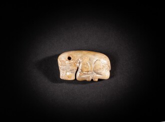 View 1 of Lot 78: A jade 'water buffalo' pendant  Late Shang dynasty - Western Zhou dynasty | 商晚期至西周 玉水牛形佩