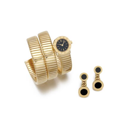 Catalog image of Yellow gold wristwatch and pair of pendant ear clips | Orologio in oro giallo e…