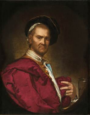 View 1 of Lot 20: Portrait of a man, half-length, wearing a red coat and a black hat, in a painted oval