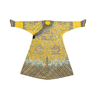 View 1 of Lot 3648: An exceptionally fine and very rare embroidered satin and pearlwork ‘Twelve Symbol’ imperial court robe, jifu, Qing dynasty, Qianlong period | 清乾隆 御製明黃色緞繡緝米珠雲龍十二章紋夾龍袍