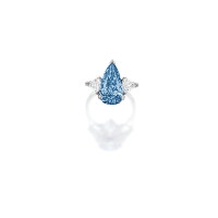 1621. important and rare fancy vivid blue diamond and diamond ri