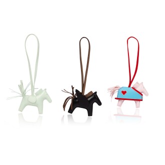 View 1 of Lot 455: Set of Three: Vert Fizz Swift Rodeo PM Charm, 2025; Black, Etoupe Swift and Milo Rodeo Pegase PM Charm, 2025 ; Rose Darling, Rouge Radieux & Bleu Céleste Swift and Milo Rodeo Robeo Coeur PM Charm, 2025