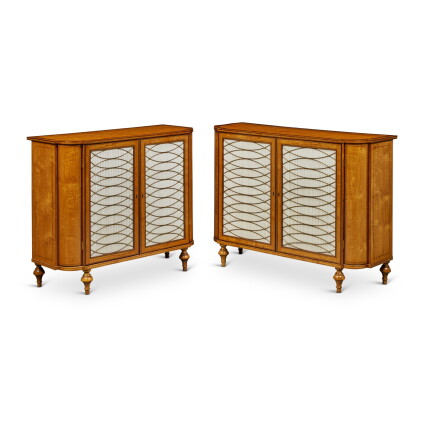 Catalog image of A Near Pair of Irish Late George III Satinwood and Amaranth- and Mahogany-Bande…