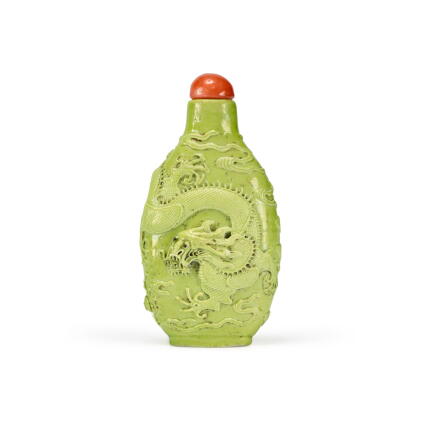 Catalog image of A molded and lime-green-enameled 'dragon' snuff bottle, Qing dynasty, 19th cent…