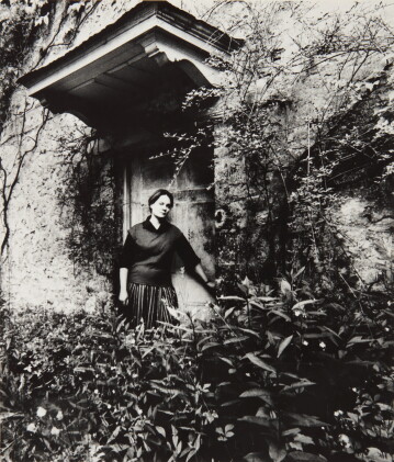 Catalog image of bill brandt | iris murdoch at her front door, steeple aston, oxfordshire, 1963