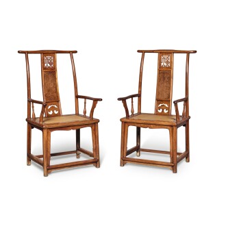 View 1 of Lot 11:  A rare pair of 'huanghuali' and 'huamu' 'Fu character' armchairs (Sichutouguanmaoyi), Late Ming / early Qing dynasty, 17th century