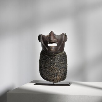 View 1 of Lot 9: A Ryoei ryubu-style mempo [face mask] | Edo period, 17th century