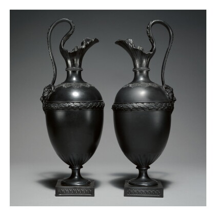 Catalog image of two wedgwood and bentley black basalt ewers circa 1775