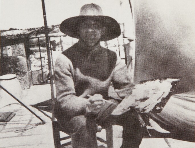 David Bomberg seated on the roof of the Banco di Roma, Jerusalem, circa 1925. Photographer unknown.
