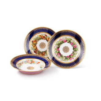 View 1 of Lot 161: A pair of Sèvres (hard-paste) porcelain faux-lapis ground botanical dessert plates, circa 1824-1830 | Paire d'assiettes en porcelaine dure de Sèvres bleu faux lapis à décor botanique, vers 1824-1830