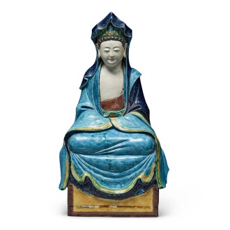 View 1 of Lot 632: A Fahua-glazed seated figure of Guanyin, Qing dynasty | 清 琺華觀音坐像