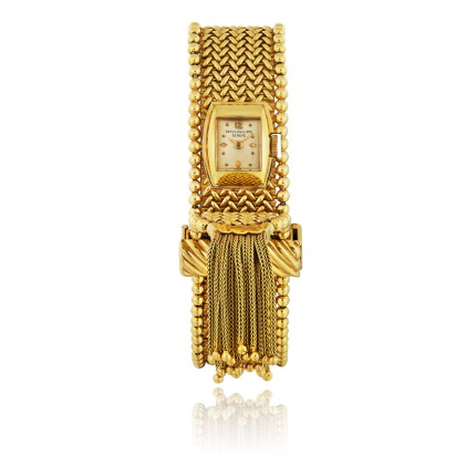 Catalog image of patek philippe | ref 3140 yellow gold concealed bracelet watch circa 1960