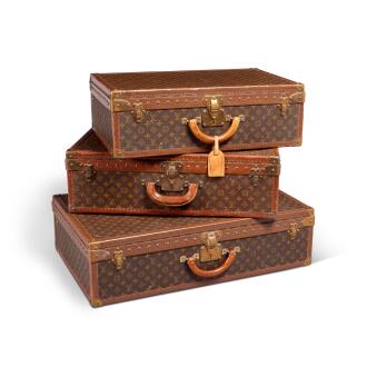 View 1 of Lot 78: Set of Three Vintage Monogram Canvas Alzer Trunks Brass Hardware