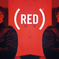 Bono holding microphone (RED) promo image