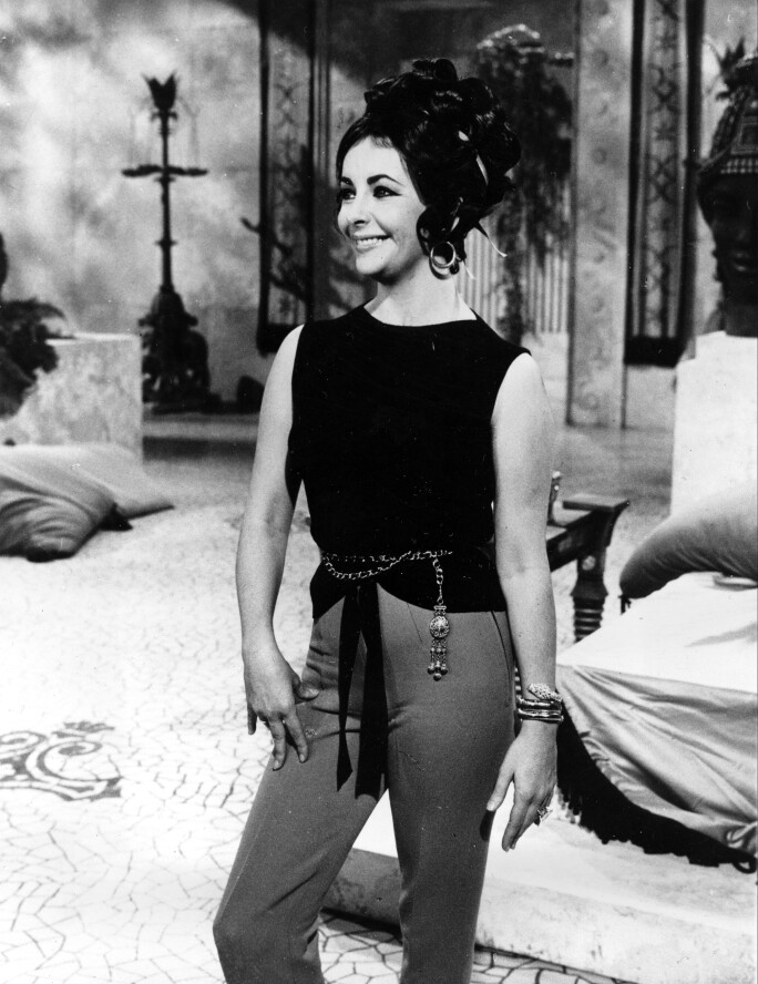 Elizabeth Taylor wearing a Bulgari 'serpentini' watch on set of Cleopatra