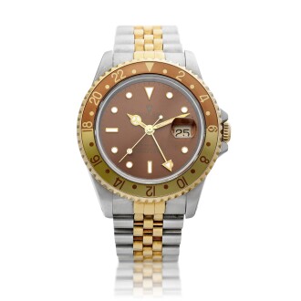 View 1 of Lot 8248: GMT-Master II, Reference 16713 | A yellow gold and stainless steel dual time zone wristwatch with date and bracelet, Circa 1991 | 勞力士 GMT-Master II 型號16713 | 黃金及精鋼兩地時間鏈帶腕錶，備日期顯示，約1991年製