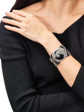 View 1 of Lot 1818: A Limited Production 'Panthère' Diamond, Onyx and Gem Set Secret Bracelet Watch | 卡地亞 | 限量出產 'Panthère' 鑽石 配 縞瑪瑙 及 寶石 腕錶