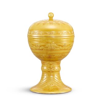 View 1 of Lot 429: A yellow-glazed altar vessel and cover, dou, Mark and period of Guangxu 清光緒 黃釉蓋豆 《大清光緒年製》款